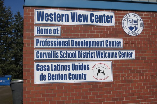 Western View Center building sign and logo (Home of:/ Professional Development Center/ Corvallis School District Welcome Center/ Casa Latinos Unidos/ de Benton County)